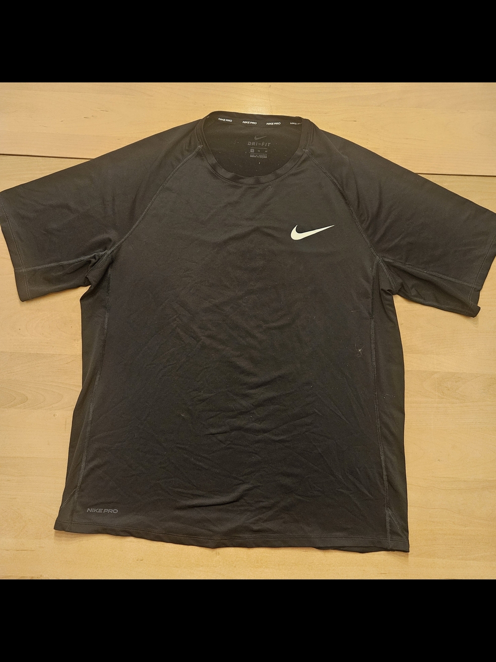 Nike Black Short-Sleeve Performance Tee with White Swoosh